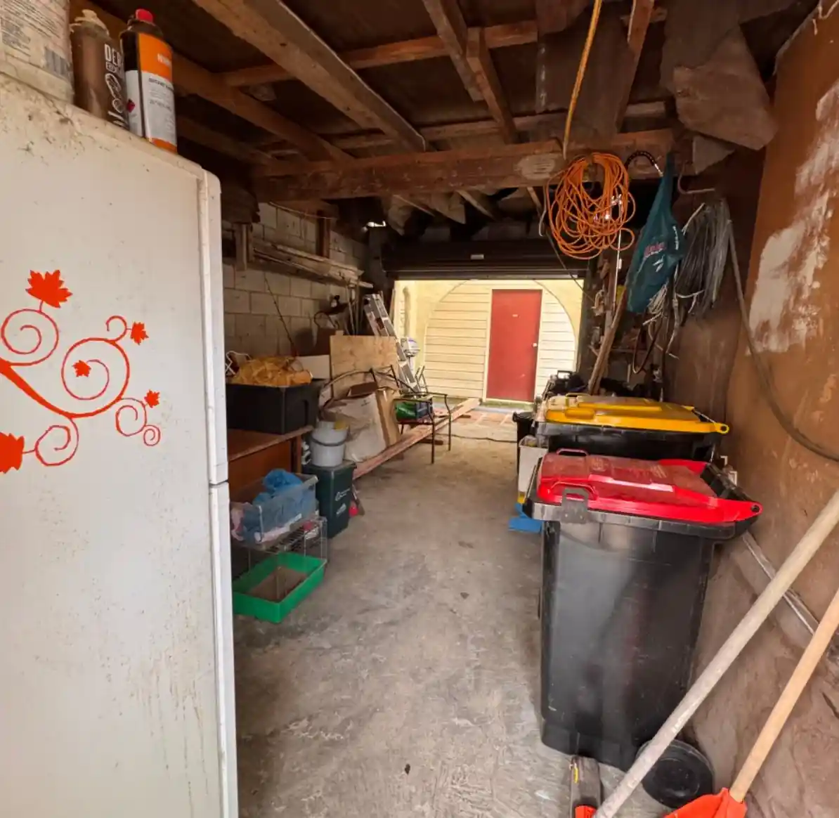 Existing old garage and storage space before becoming a habitable rumpus