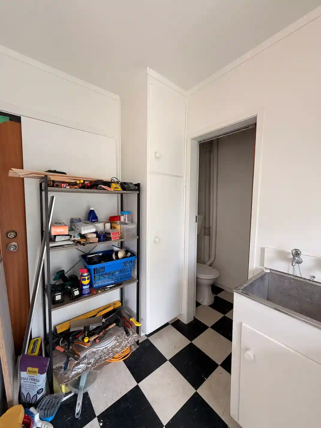 Existing ground floor bathroom and laundry area before renovation