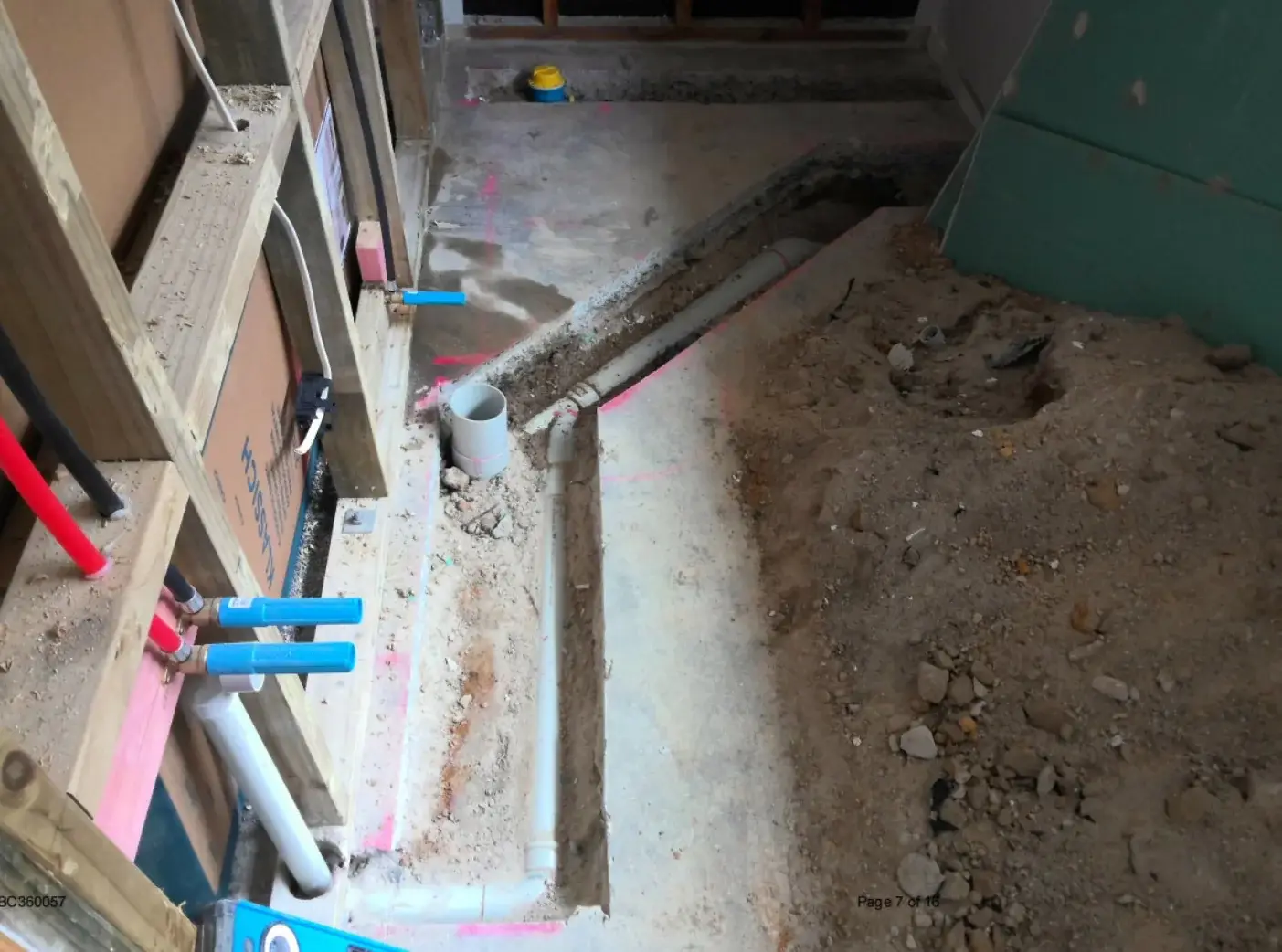 Floor chase cut in concrete slab with 100mm WC waste and 65mm branch drain